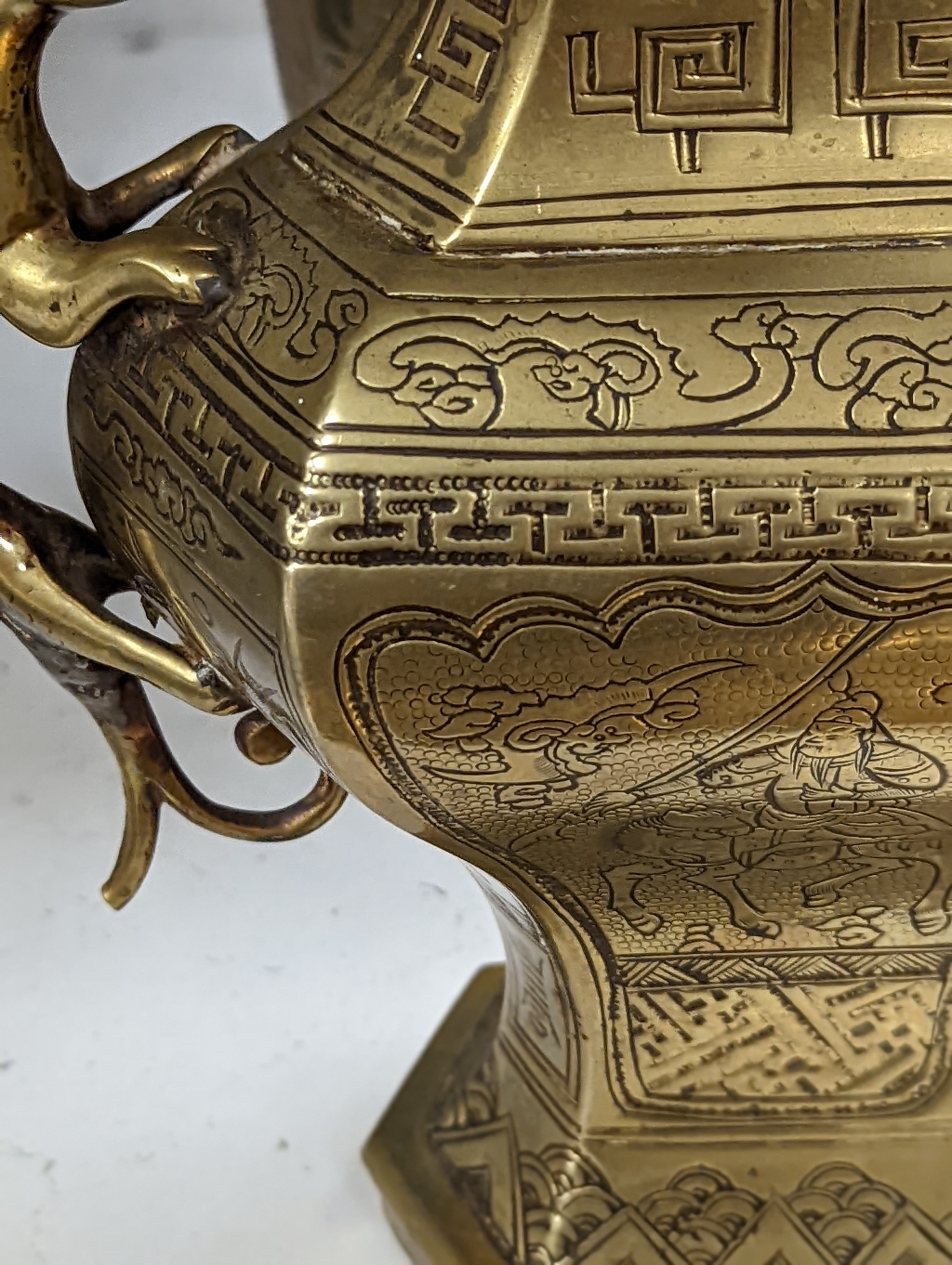 Two early 20th century Chinese bronze vases and a similar tray, 35cm diam.